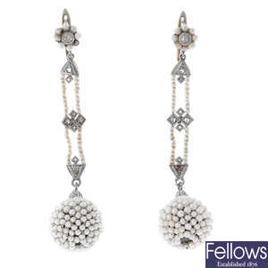 A pair of early 20th century seed pearl and diamond earrings.