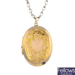 An early 20th century gold back and front locket, with a 9ct gold chain.