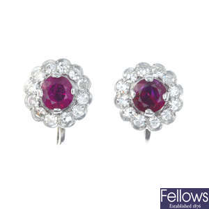 A pair of early 20th century 9ct gold ruby and diamond floral cluster earrings.