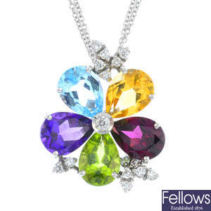 An 18ct gold diamond and gem-set flower pendant, on chain.