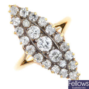 An early 20th century gold diamond cluster ring.