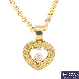 CHOPARD - an 18ct gold sapphire and diamond 'Happy Diamonds' pendant, with 18ct gold chain.