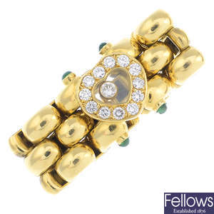 CHOPARD - an 18ct gold diamond and emerald 'Happy Diamonds' ring.