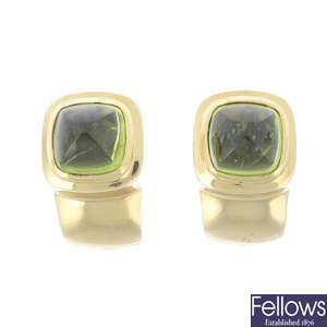 A pair of 14ct gold peridot earrings.