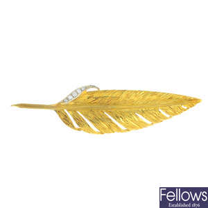A mid 20th century 18ct gold diamond feather brooch.