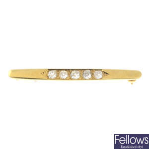 An 18ct gold diamond bar brooch.