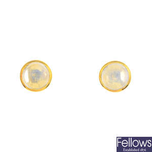 A pair of moonstone single-stone earrings.