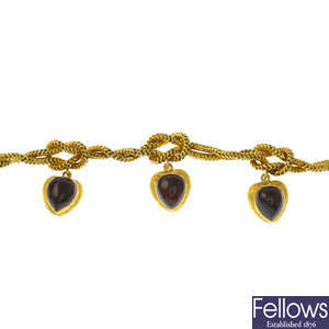 A mid Victorian gold foil-back garnet bracelet.