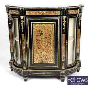 An early 20th century simulated tortoiseshell and brass inlaid Boulle work credenza.