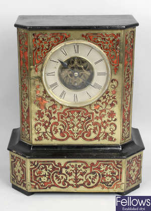 A late 19th century ebonised and boulle work cased eight day mantel clock.