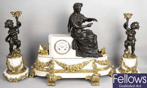 A late 19th century white marble and bronze mounted French clock garniture,