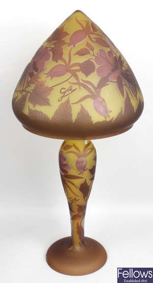A reproduction Galle style Art Nouveau overlaid and cut glass lamp.