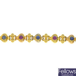 An 18ct gold ruby and sapphire bracelet.
