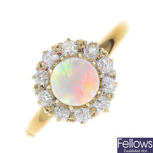 An early 20th century 18ct gold opal and diamond cluster ring.