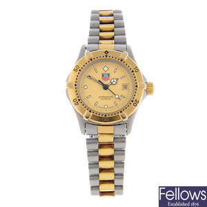 TAG HEUER - a lady's bi-colour 2000 Series bracelet watch.