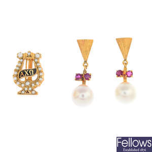 Three pairs of gem-set earrings and a sorority brooch.