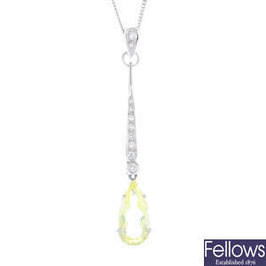 An 18ct gold quartz and diamond pendant, with 18ct gold chain.