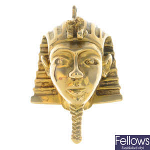 A 9ct gold Egyptian mask pendant.