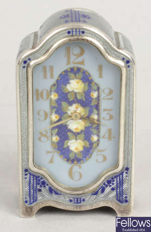 An early 20th century 925 sterling silver and enamelled miniature clock.