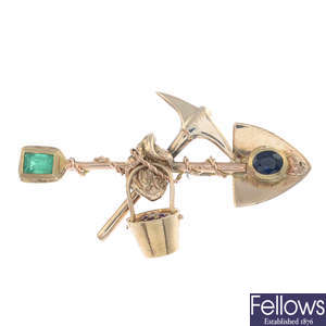 An early 20th century 9ct gold gem-set 'Digger's' brooch.