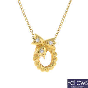 DIOR -  a diamond pendant, with chain.