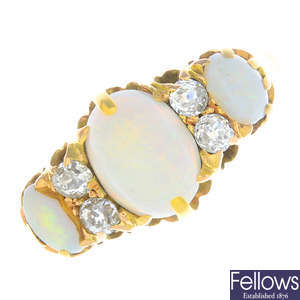 A late Victorian 15ct gold opal three-stone and diamond ring.
