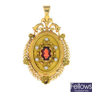 An 18ct gold garnet and seed pearl pendant.
