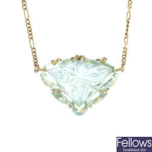A 9ct gold beryl and diamond pendant, on chain.