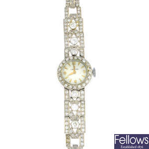 OMEGA - a lady's mid 20th century diamond cocktail watch.