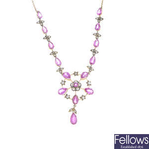 An early 20th century gold synthetic pink sapphire and split pearl necklace.