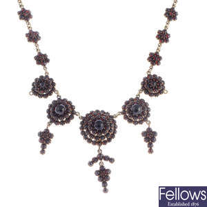 A late Victorian garnet necklace.