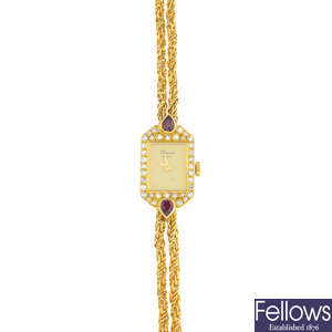 CHOPARD - a lady's 18ct gold diamond and ruby cocktail watch.