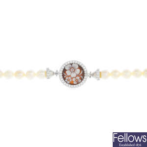 A shell cameo, cultured pearl and cubic zirconia bracelet.
