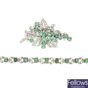 An emerald and paste brooch and matching bracelet.
