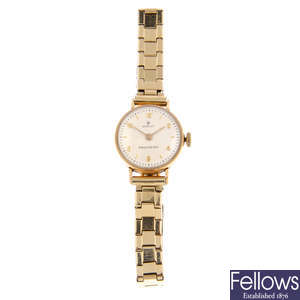 ROLEX - a lady's 18ct yellow gold Precision bracelet watch.