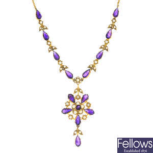 An Edwardian gold amethyst and split pearl necklace.