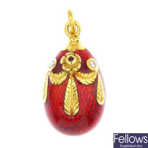 FABERGE - an 18ct gold enamel, ruby and diamond egg pendant.