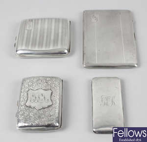 An Edwardian silver cigarette case & three slightly later examples. (4).