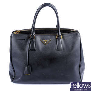 PRADA - a black Saffiano leather handbag.