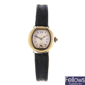 MOVADO - a lady's yellow metal wrist watch.