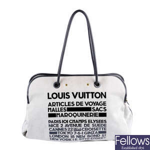 LOUIS VUITTON - a limited edition Articles de Voyage Malles handbag.