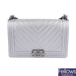 CHANEL - a chevron quilted silver leather Boy handbag.