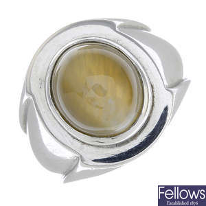 A platinum cat's-eye chrysoberyl single-stone ring.