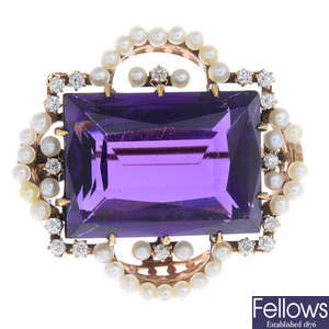 An early 20th century gold amethyst, diamond and seed pearl brooch.