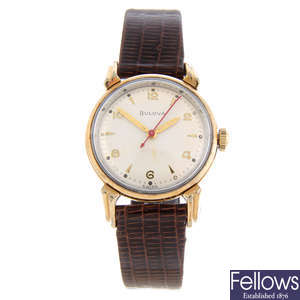 BULOVA - a gentleman's gold plated wrist watch together with two gold plated Bulova wrist watches.
