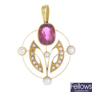 An early 20th century gold tourmaline and split pearl pendant.
