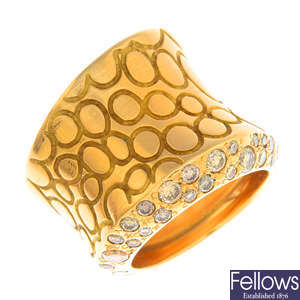 POMELLATO - an 18ct gold 'brown' diamond and diamond 'Cocco' band ring.