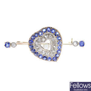 An early 20th century gold sapphire and diamond heart brooch.
