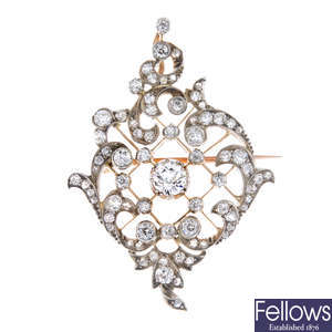 A late 19th century silver and gold diamond pendant.