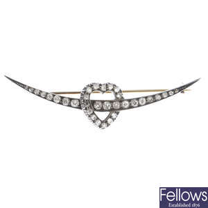 A late Victorian silver and gold diamond heart and crescent brooch.